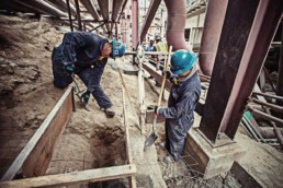 Workmen making a concrete form