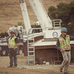 Crew members with bridge pre-installation